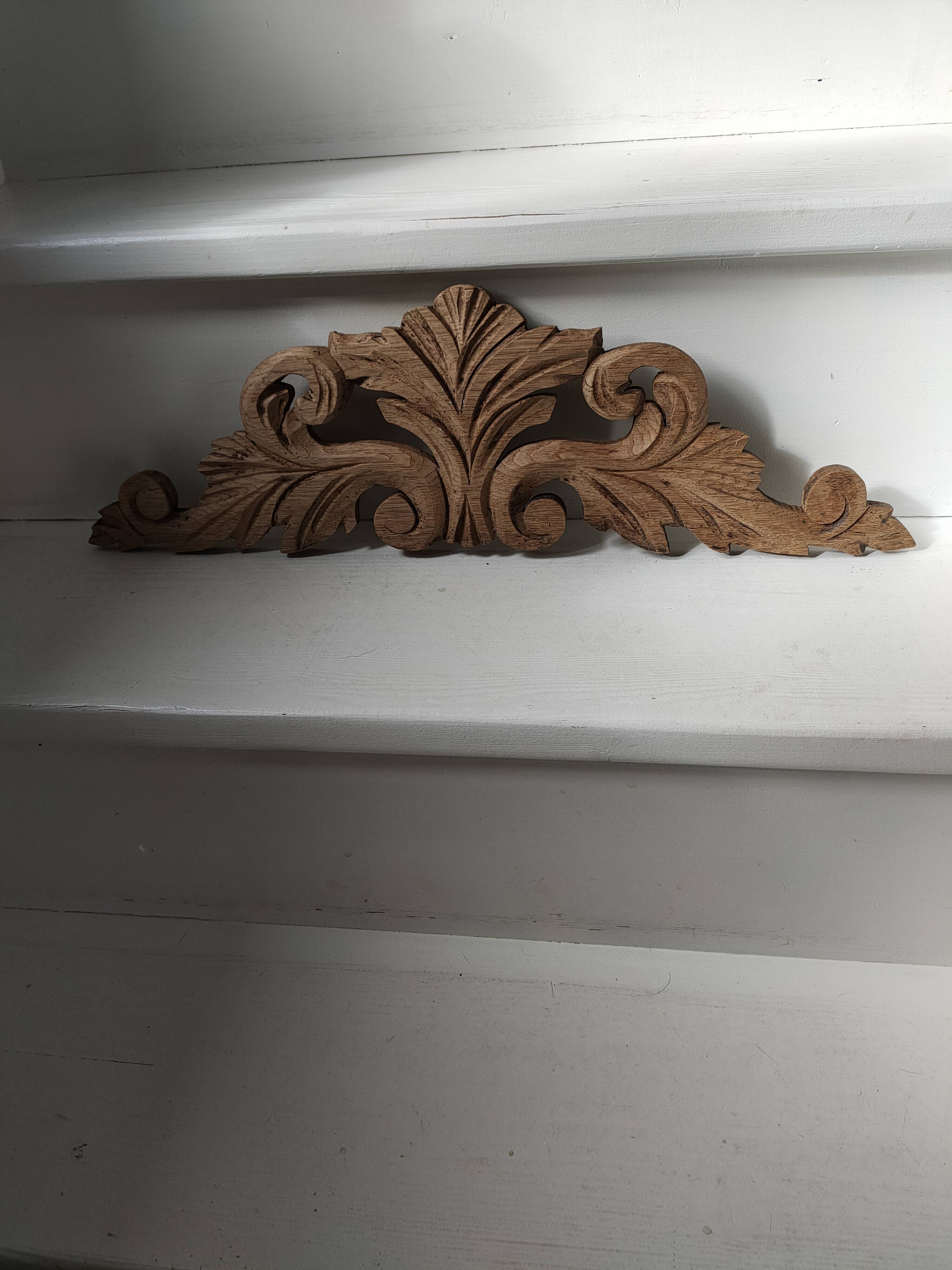 Old pediment in cut wood