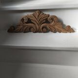 Old pediment in cut wood