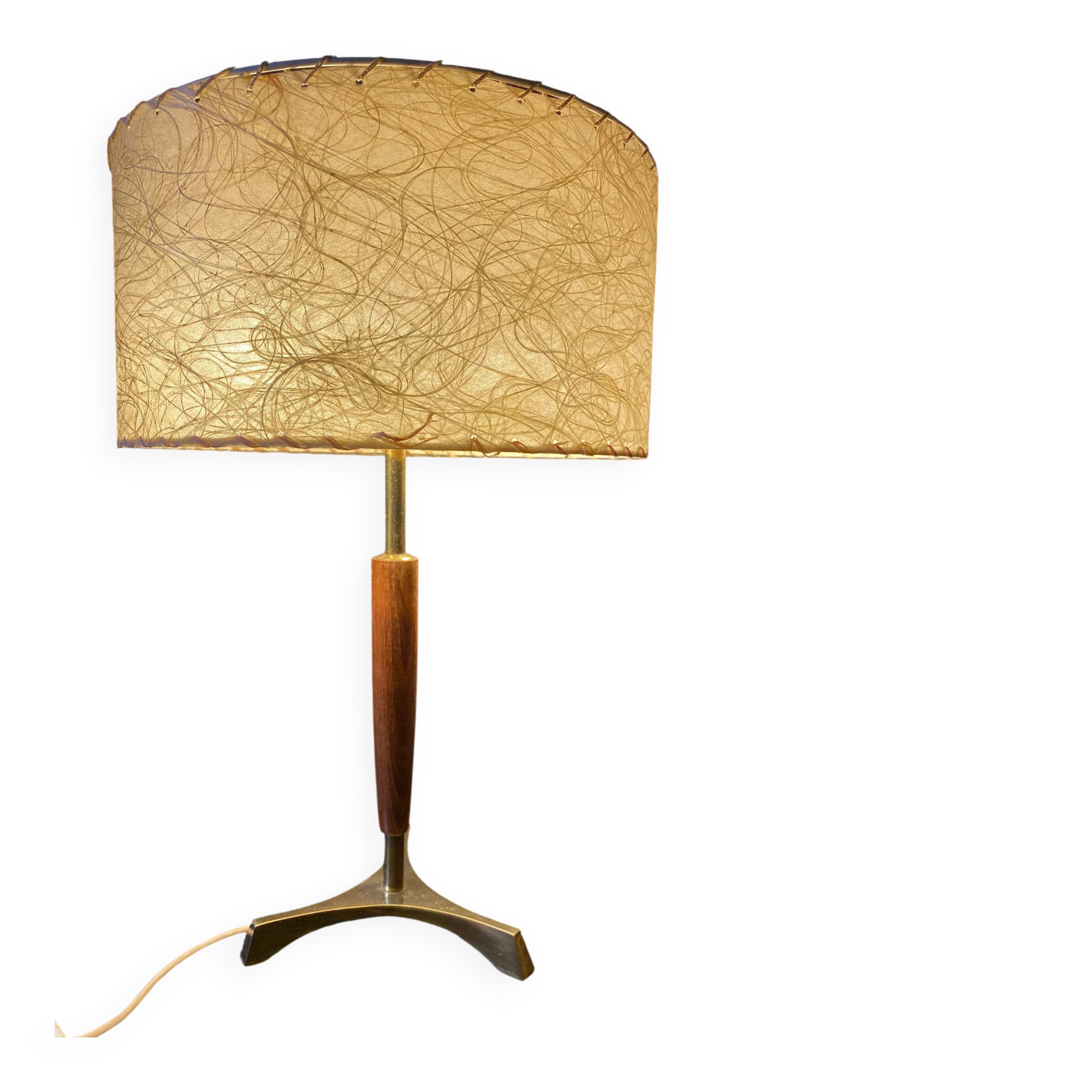Elegant table lamp with a slender teak body on a tripod brass base, Germany, 1960s.