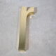 Letter sign in gold metal "R" 1980