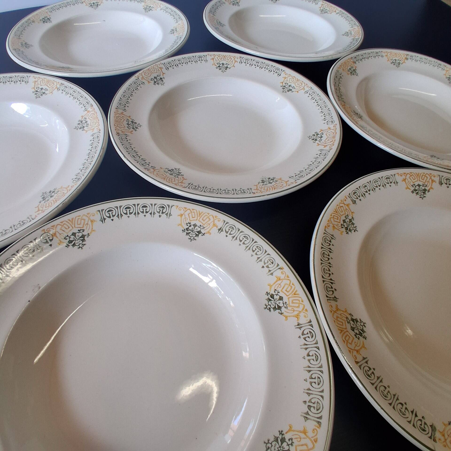 Set of 7 antique deep plates from Longwy, "Savigny" model, in good condition.