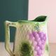 Barbotine pitcher from the 20s/30s with vine and grape decoration, Saint-Clément earthenware factory