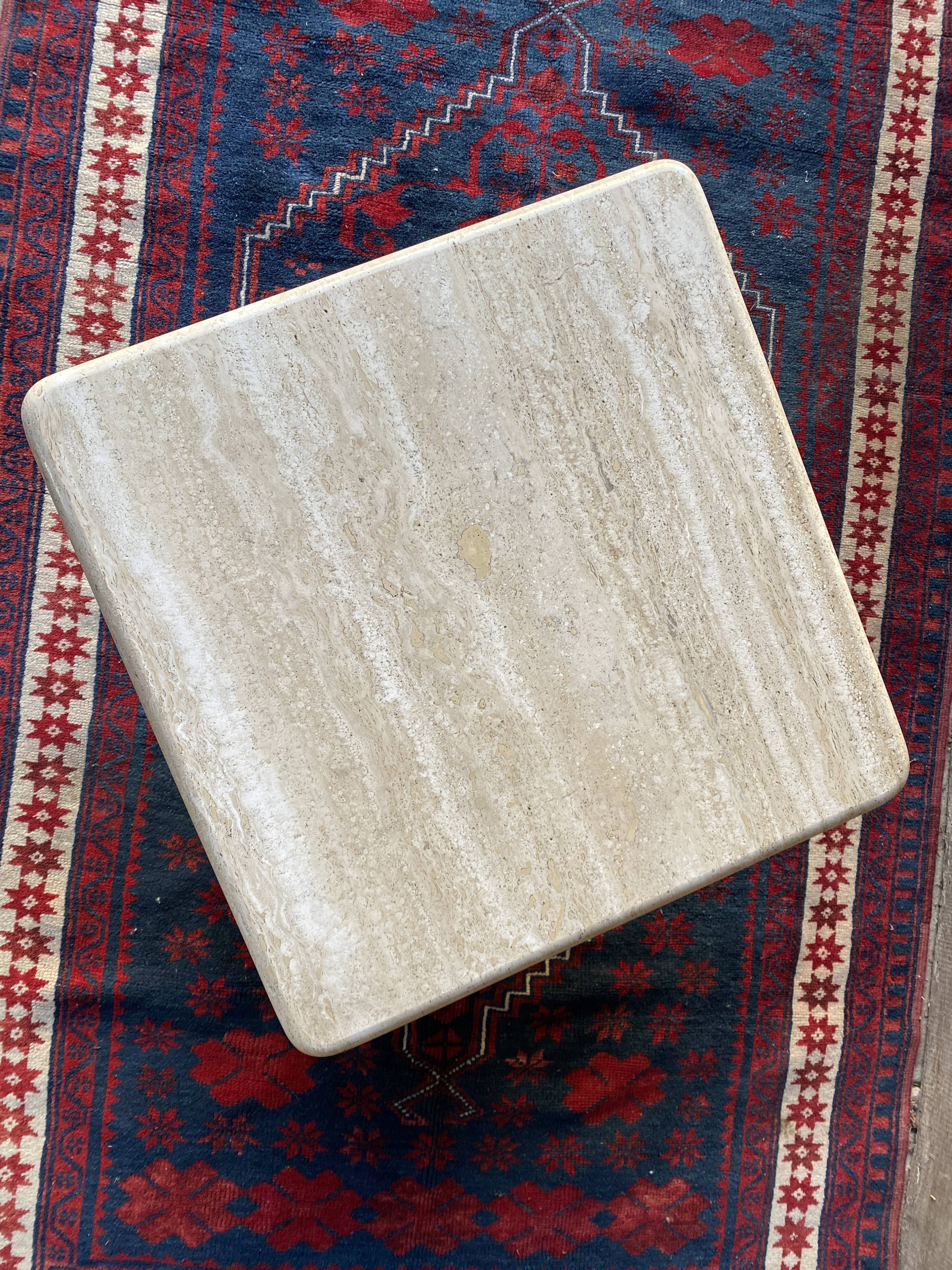 Coffee table in travertine