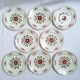 Assiettes plates vertes et bordeaux des années 50's