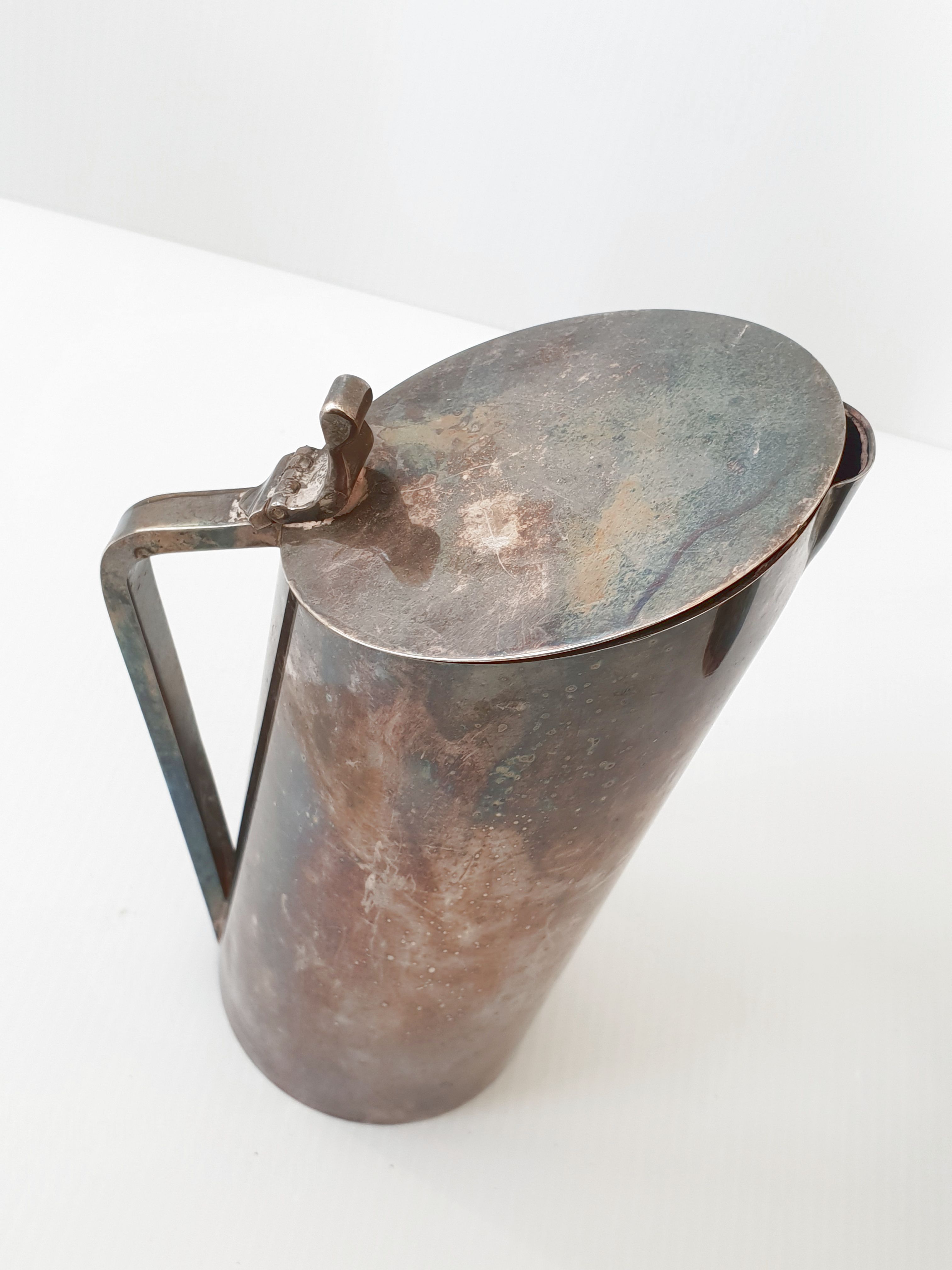 Suite of 3 pitchers in vintage 1970 silver metal