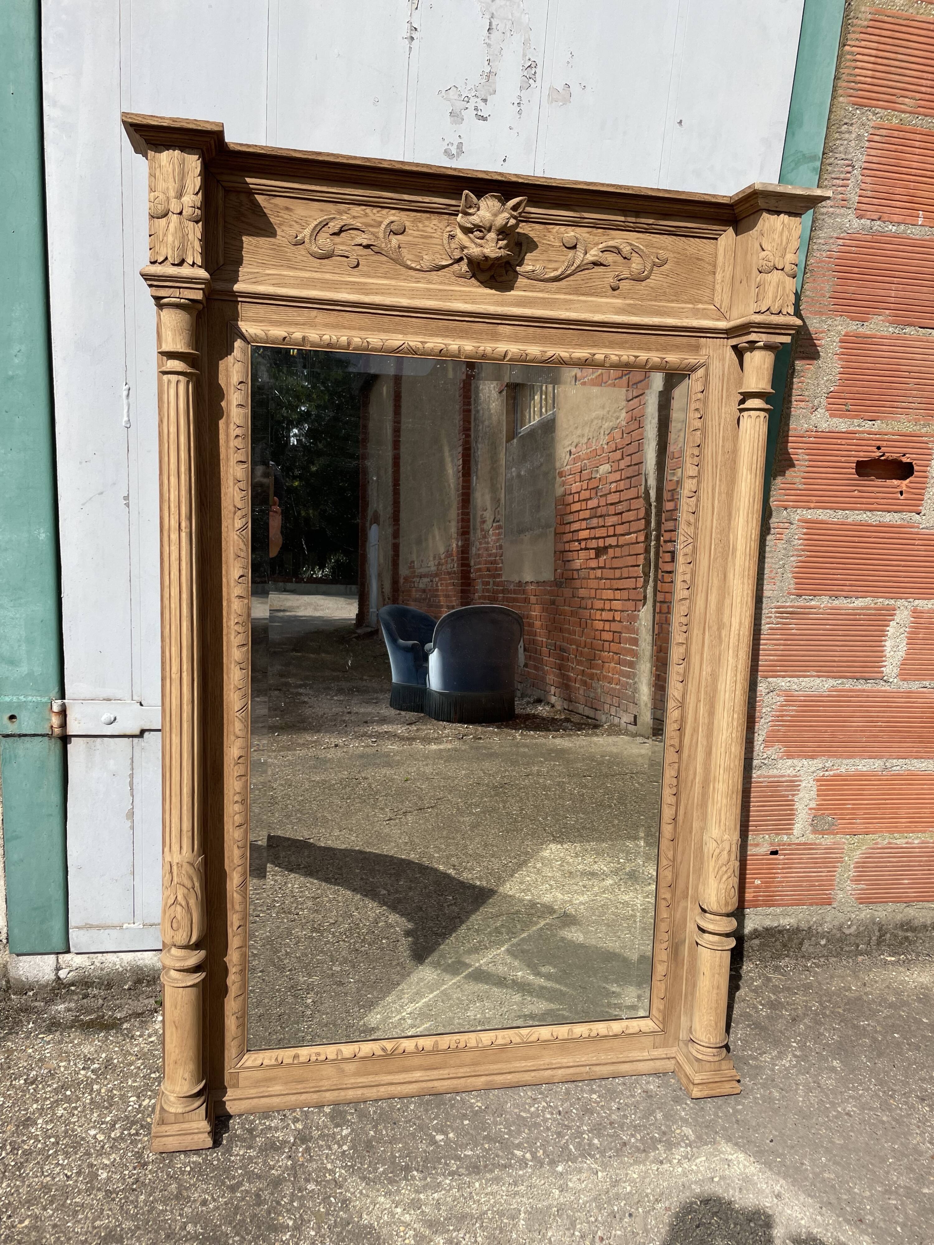 Mirror in oak aero erased wolf's head Henri II