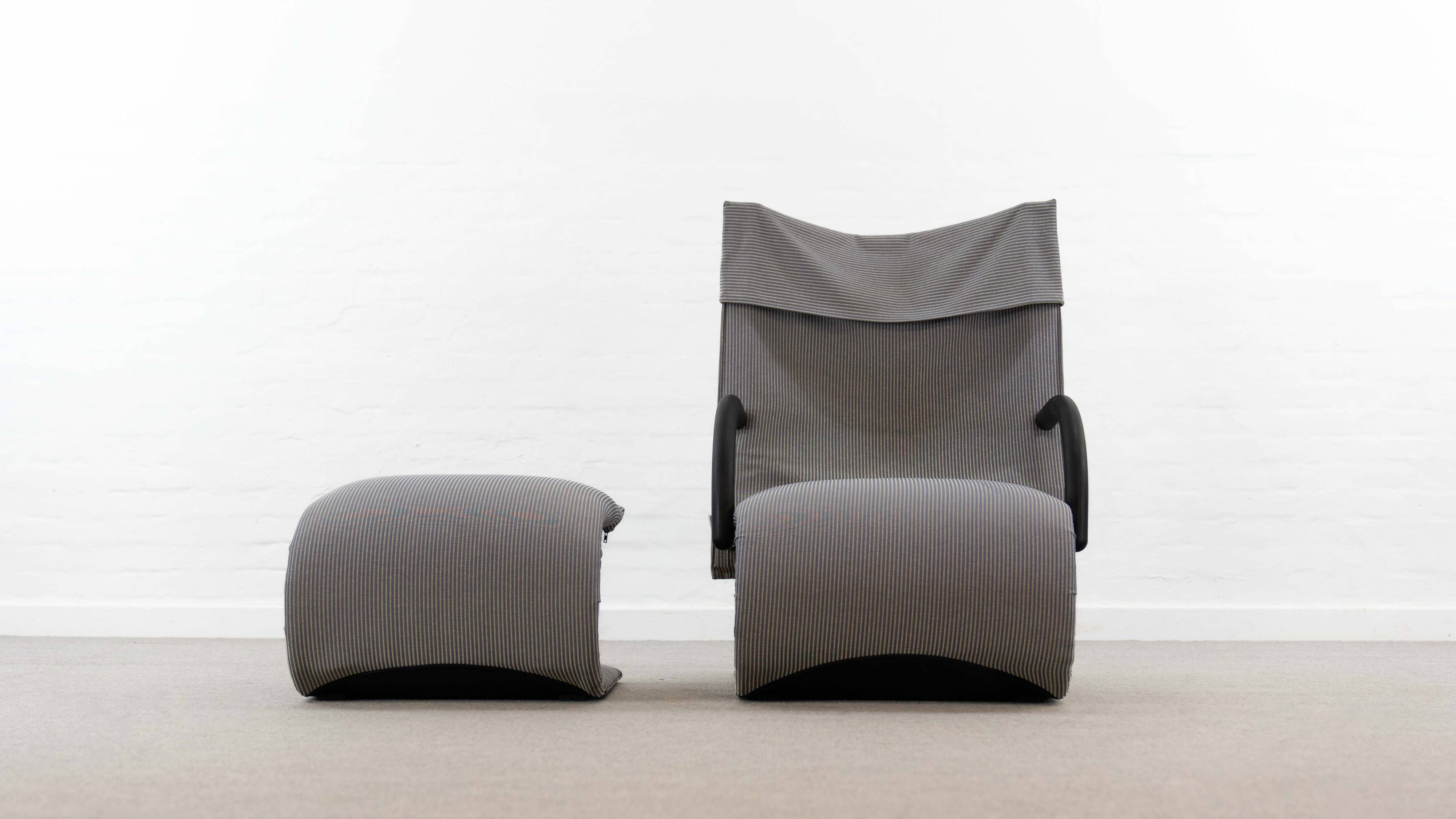 Zen easy chair with footrest by claude brisson for ligne roset