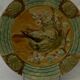 Slop bowl with bird decoration.
