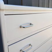 Compass leg chest of drawers