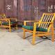 Paire de fauteuils ton vert foncé