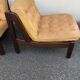 Leather and wood armchairs 70s