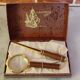 Magnifying glass and paper cutter box in leather and brass