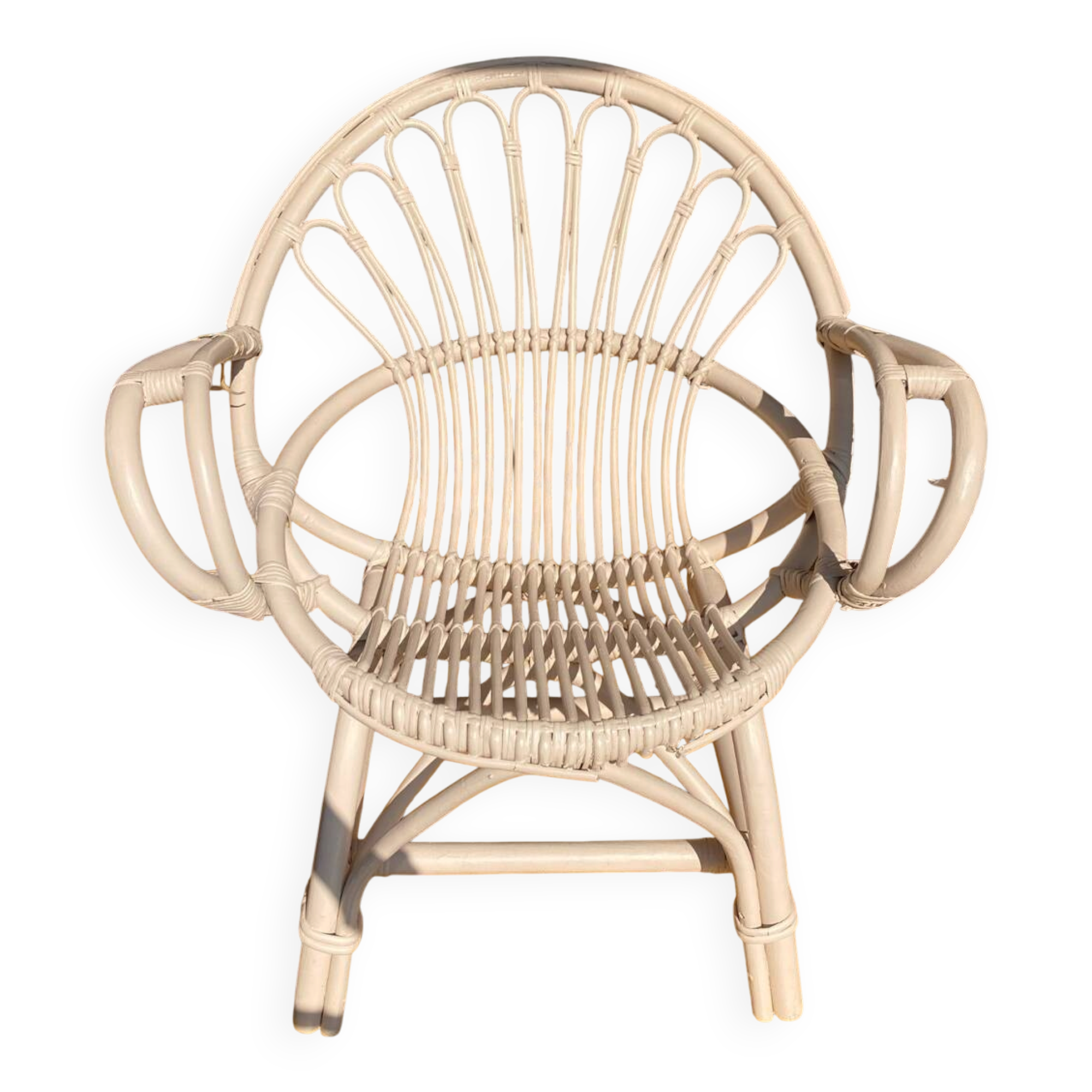 Shell chair in pale pink painted rattan