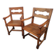 Pair of vintage oak armchairs with geometric design.
