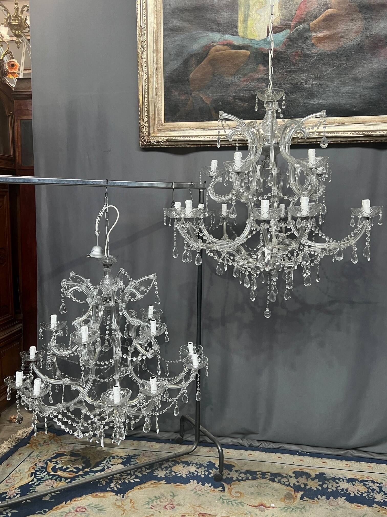 Pair of large Maria Theresa chandeliers. Crystal and glass.