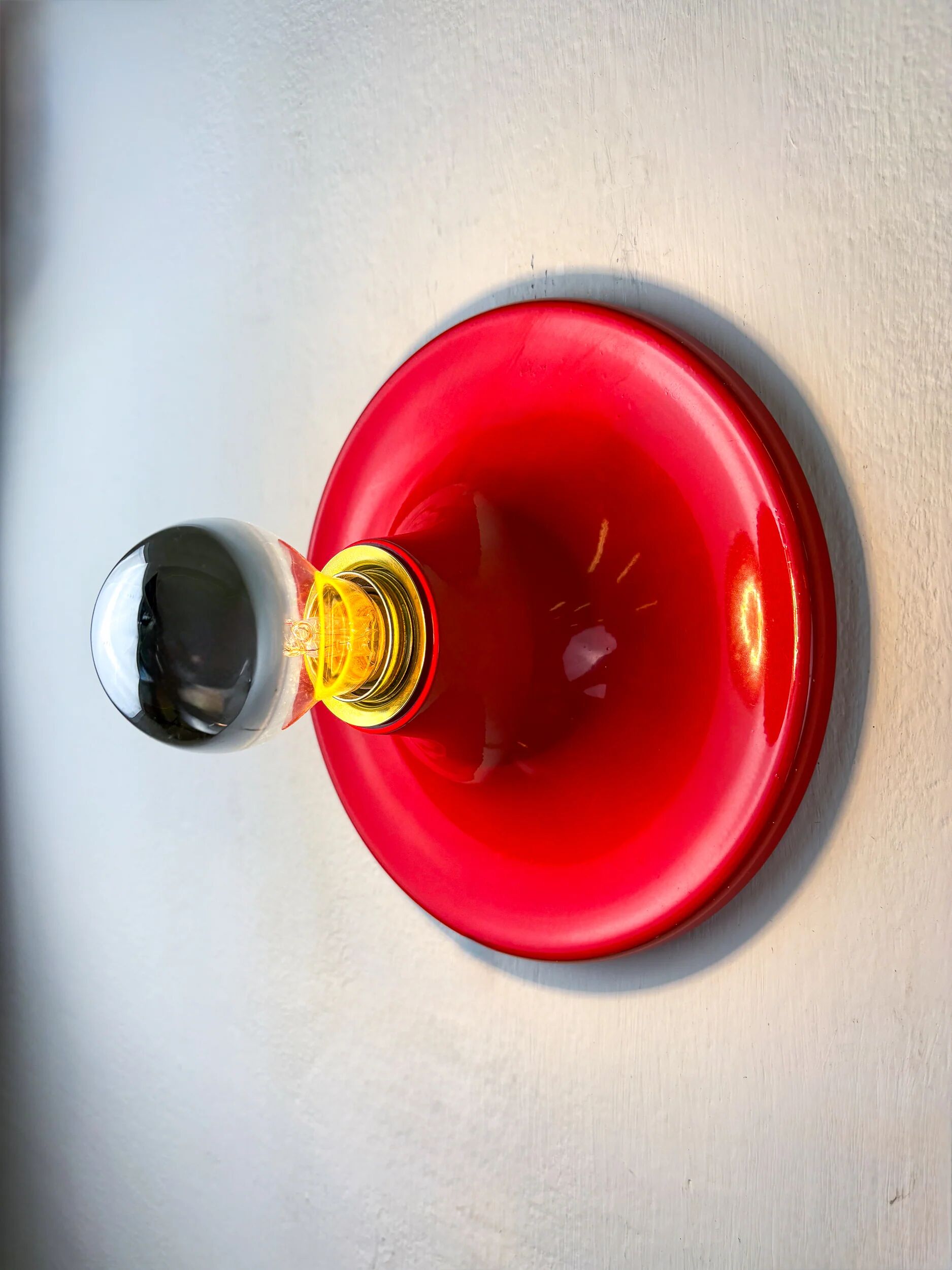 Pair of red Targetti Sankey sconces, 1970s, Italy