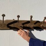 Wooden wall-mounted coat rack