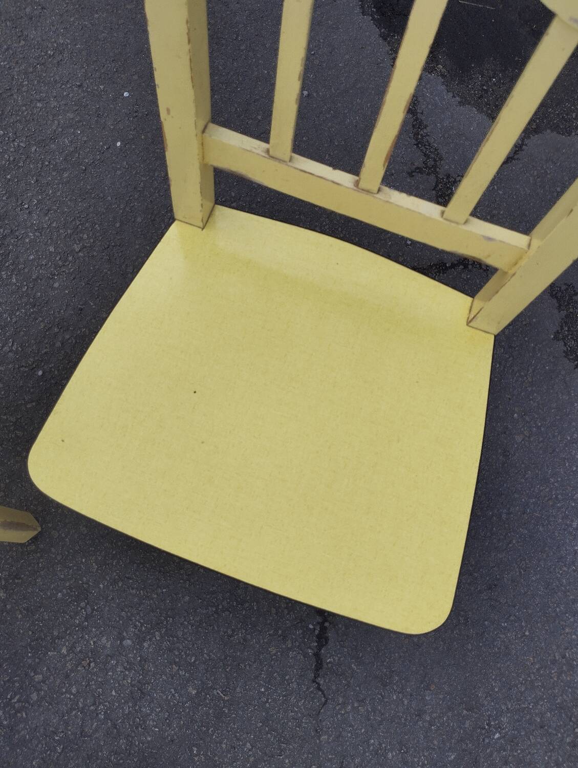 Pair of wooden and yellow formica chairs