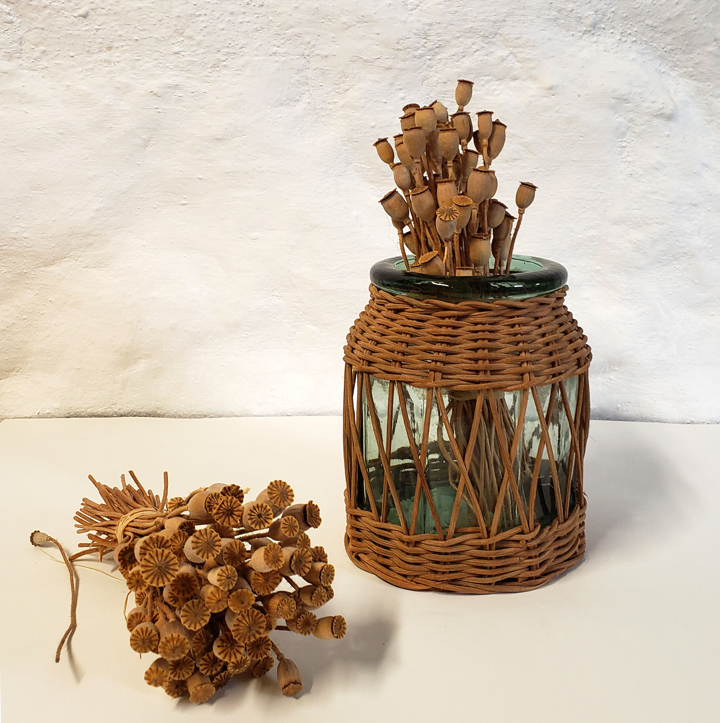 Glass and rattan vase