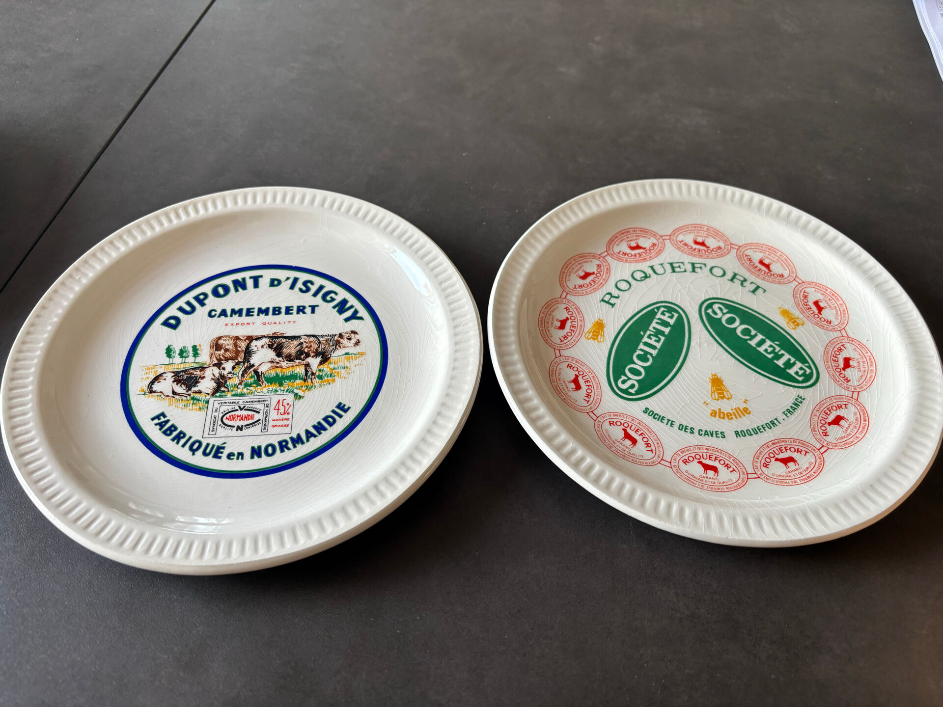 6 ceramic cheese plates from St Armand, France, in their box.