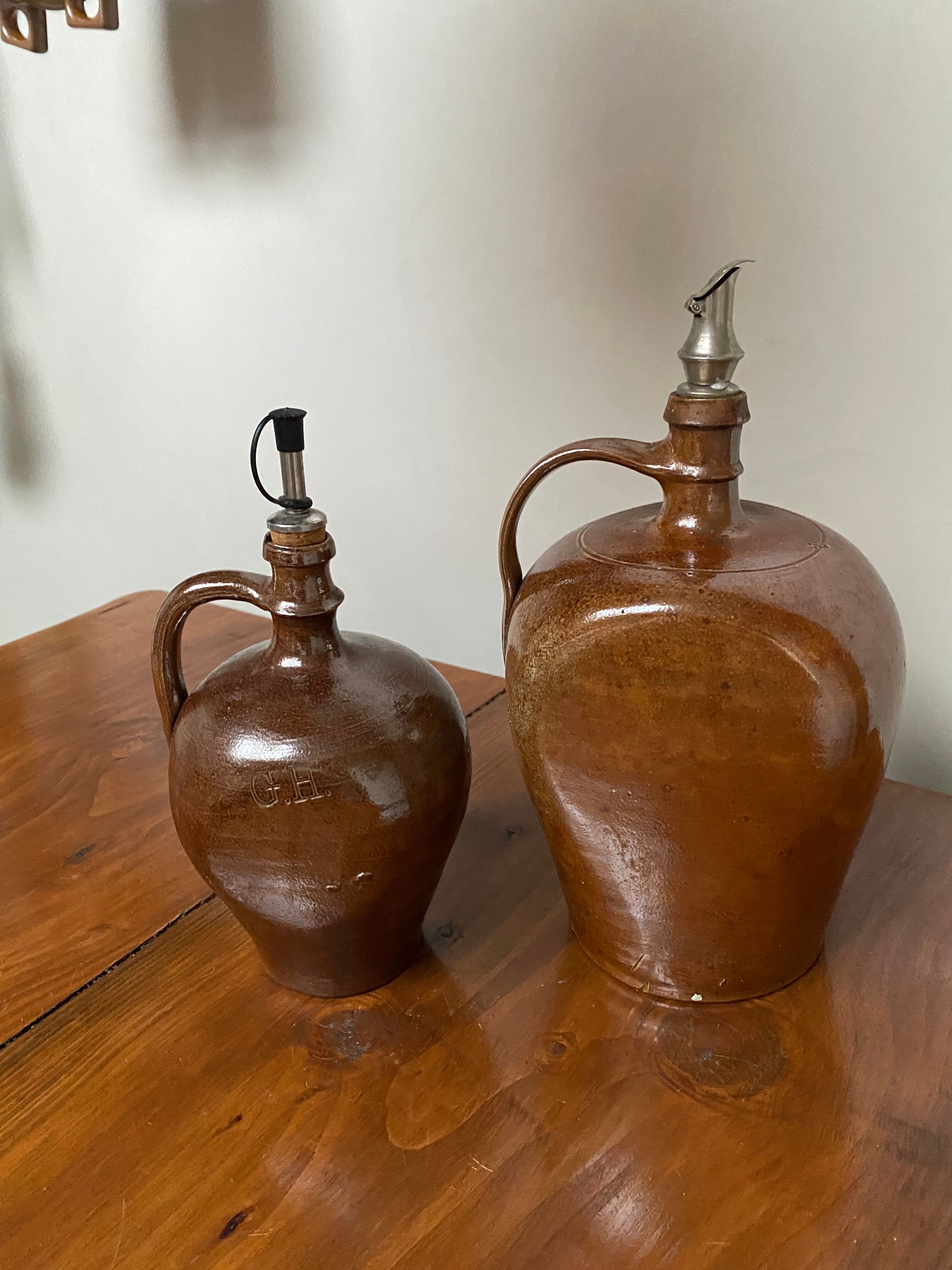 Pair of bottles in sandstone