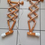 Pair of wooden scissor wall lamps
