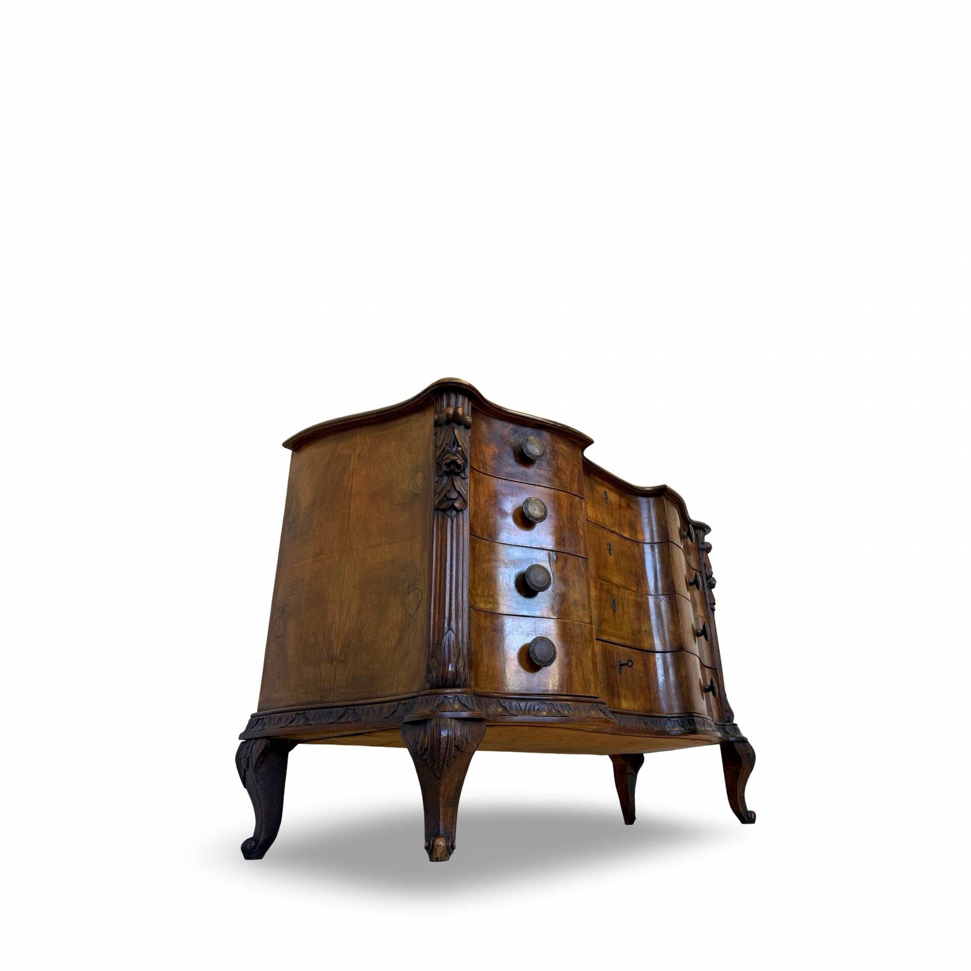 serpentine commode in antique walnut