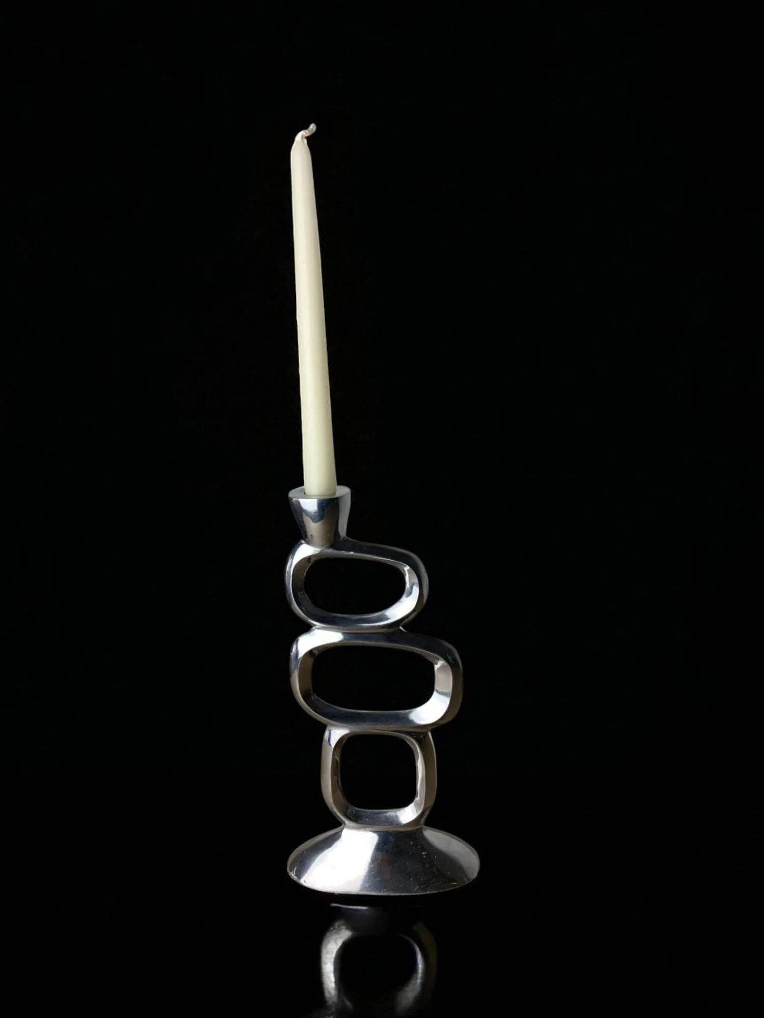 Circle candlestick by Matthew Hilton, aluminium, 1980s
