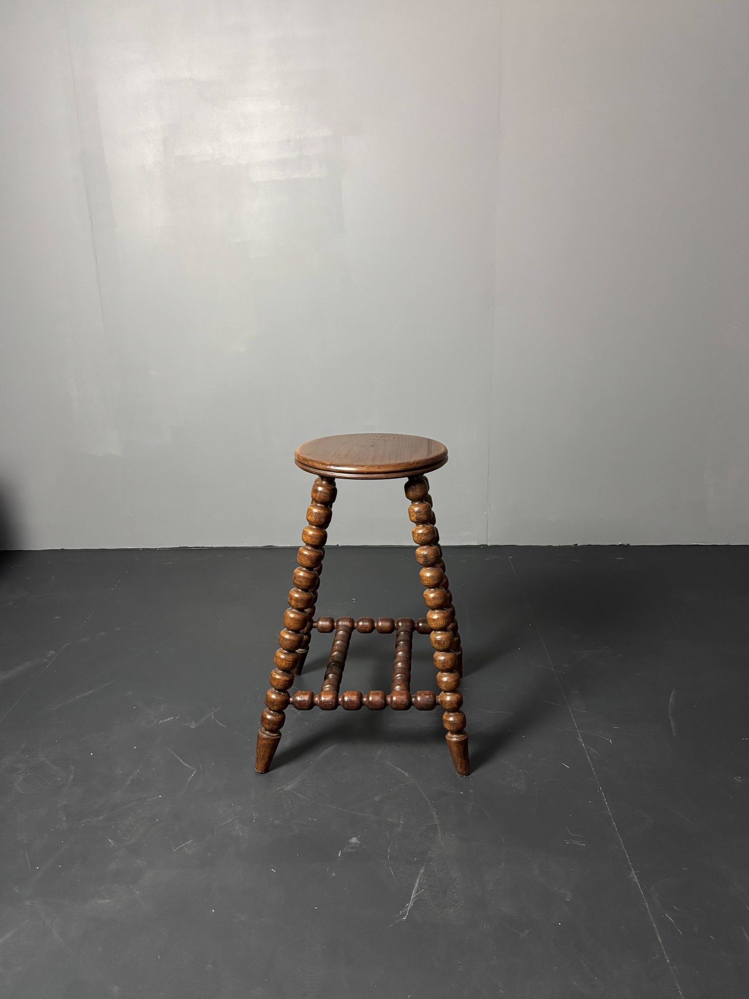 Midcentury brutalist wood turned stool in the style of Charles Dudouyt, 50s