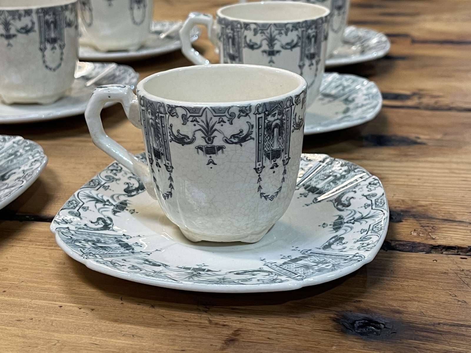 6 cups and saucers in Gien earthenware with Mascaron decoration from the early 20th century.