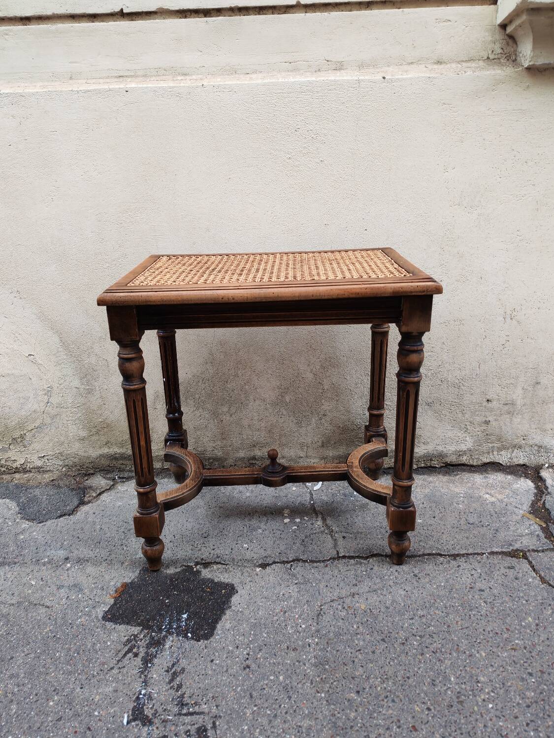 Wooden and cane bench