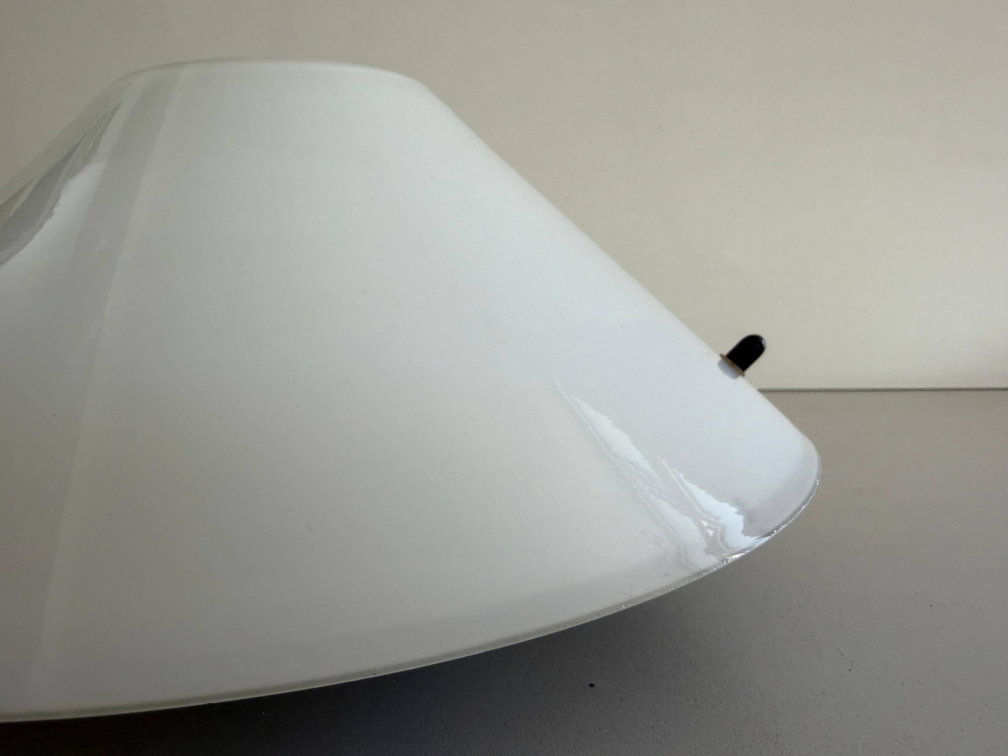 Simple opal glass wall light from the mid-century by Lamperti, 1960s, Italy.