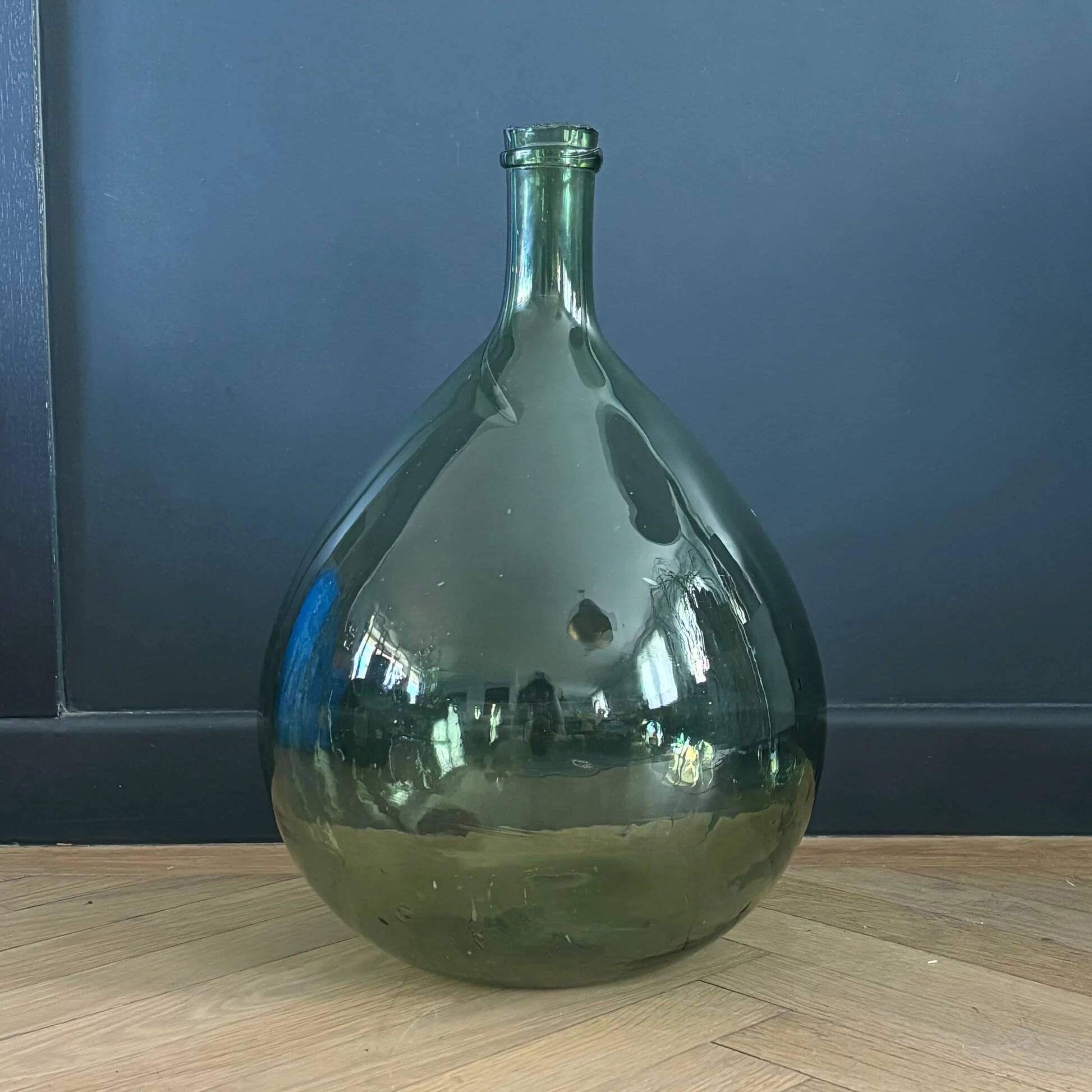 Antique green glass carafe