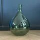 Antique green glass carafe