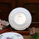 Three small hand-painted Saint-Clément dinner plates.