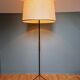 Vintage tripod floor lamp in black lacquered metal and brass, 50s