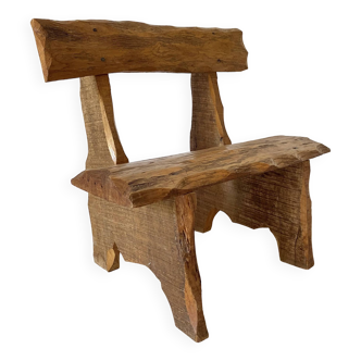 Brutalist low chair in solid wood