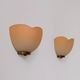Vintage brass and orange glass wall sconces, France 1970.