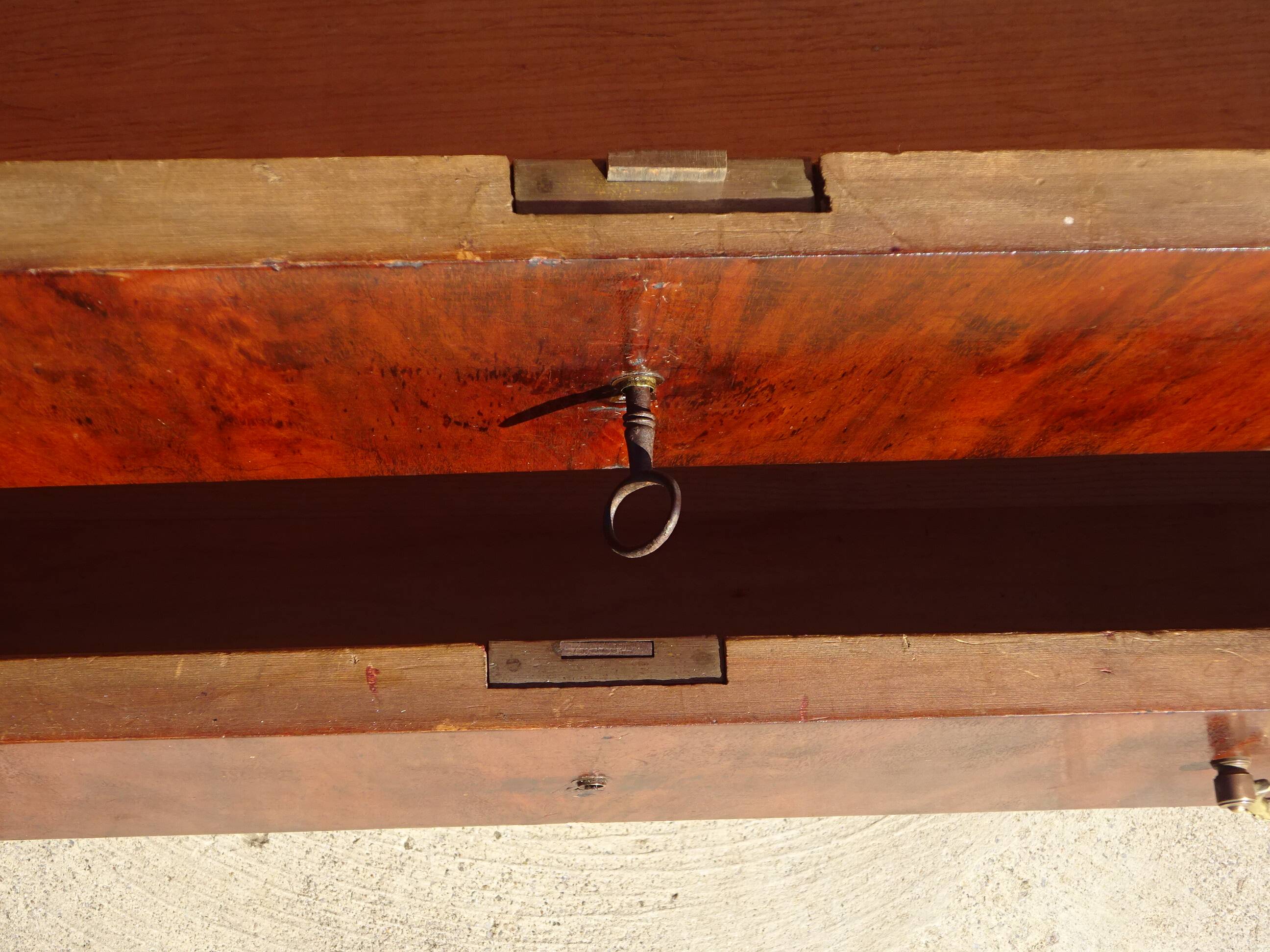 Antique mahogany chest of drawers with white marble.
