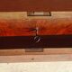 Antique mahogany chest of drawers with white marble.