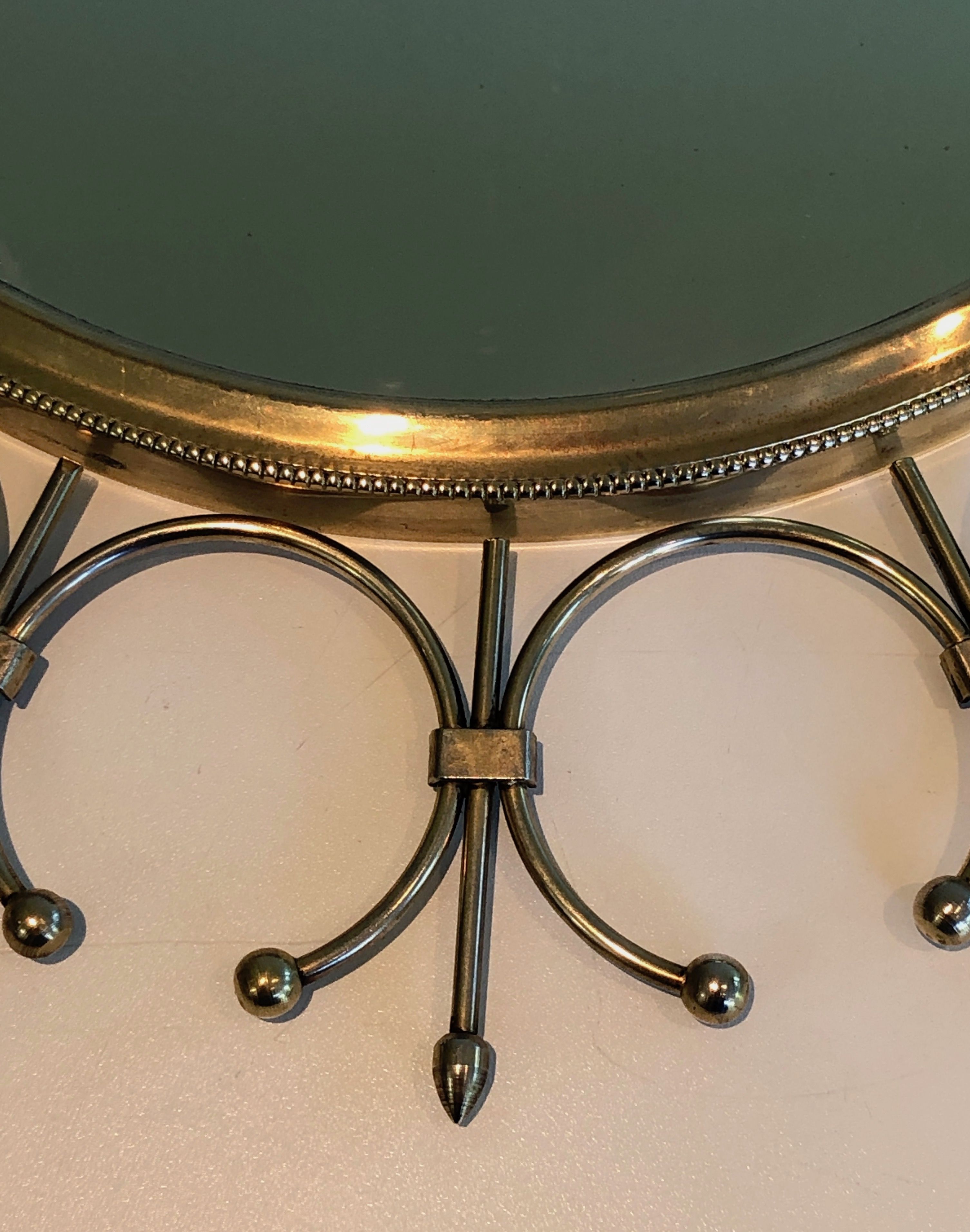 Sun mirror in brass and brushed steel