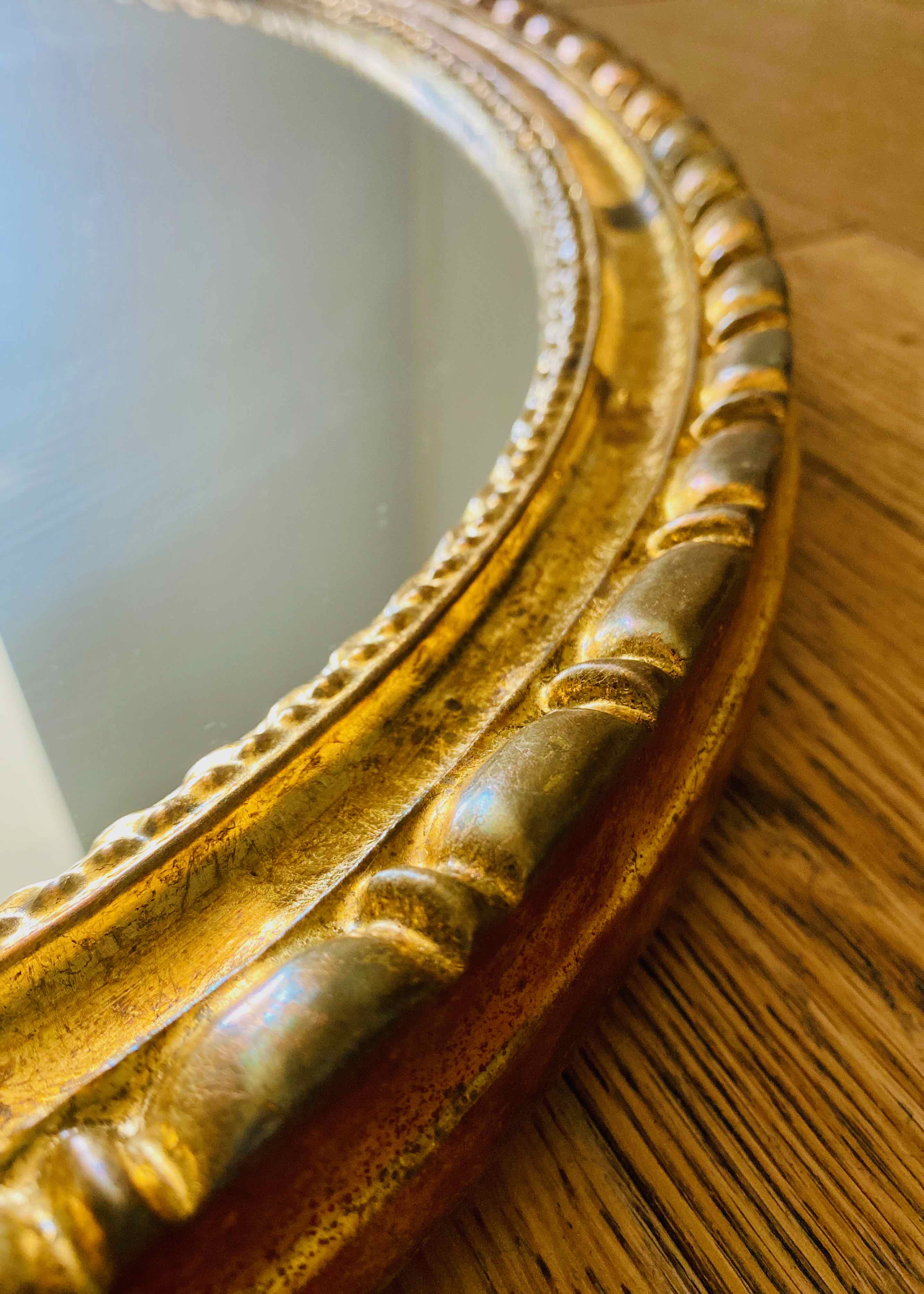 Miroir ovale doré, années 50/60