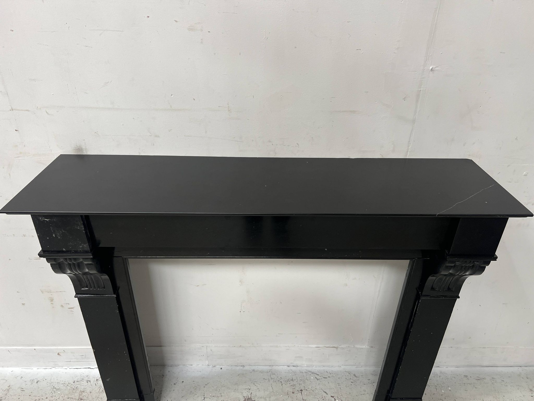 Napoleon III period fireplace with a black marble corbel. 19th century.