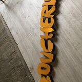Beautiful letters in yellow from butchery