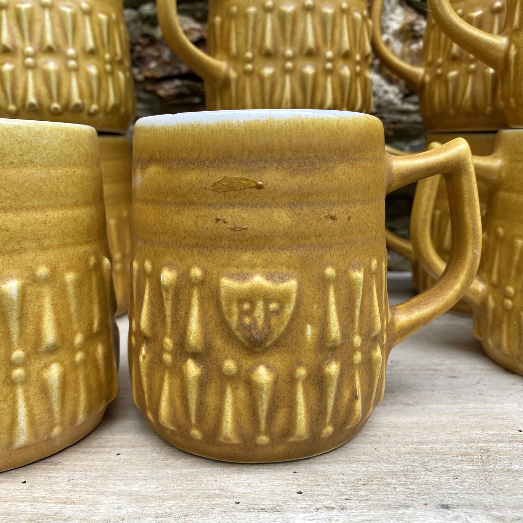 Vintage BP ceramic mugs from the 1970s.