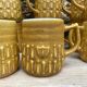 Vintage BP ceramic mugs from the 1970s.