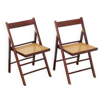 2 folding wooden chairs and canning