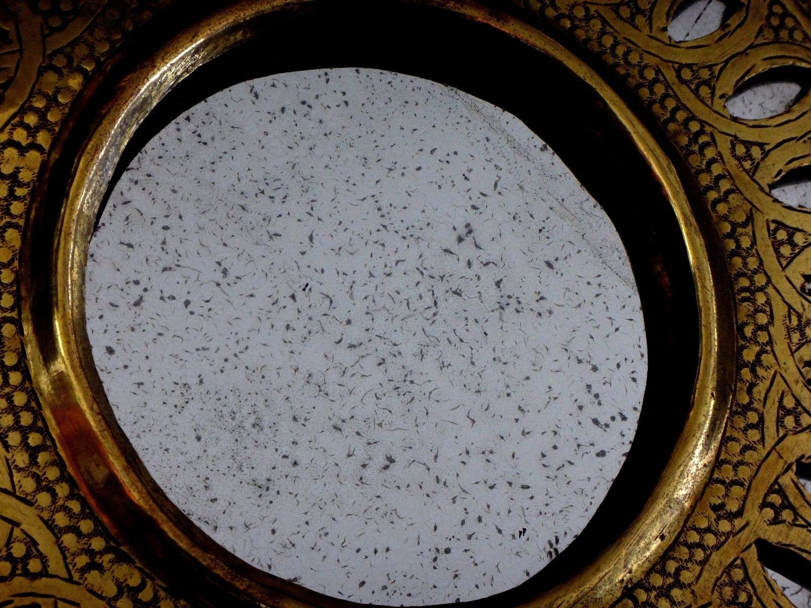 Old round oriental mirror in chiseled brass 29cm