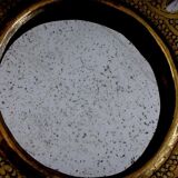 Old round oriental mirror in chiseled brass 29cm