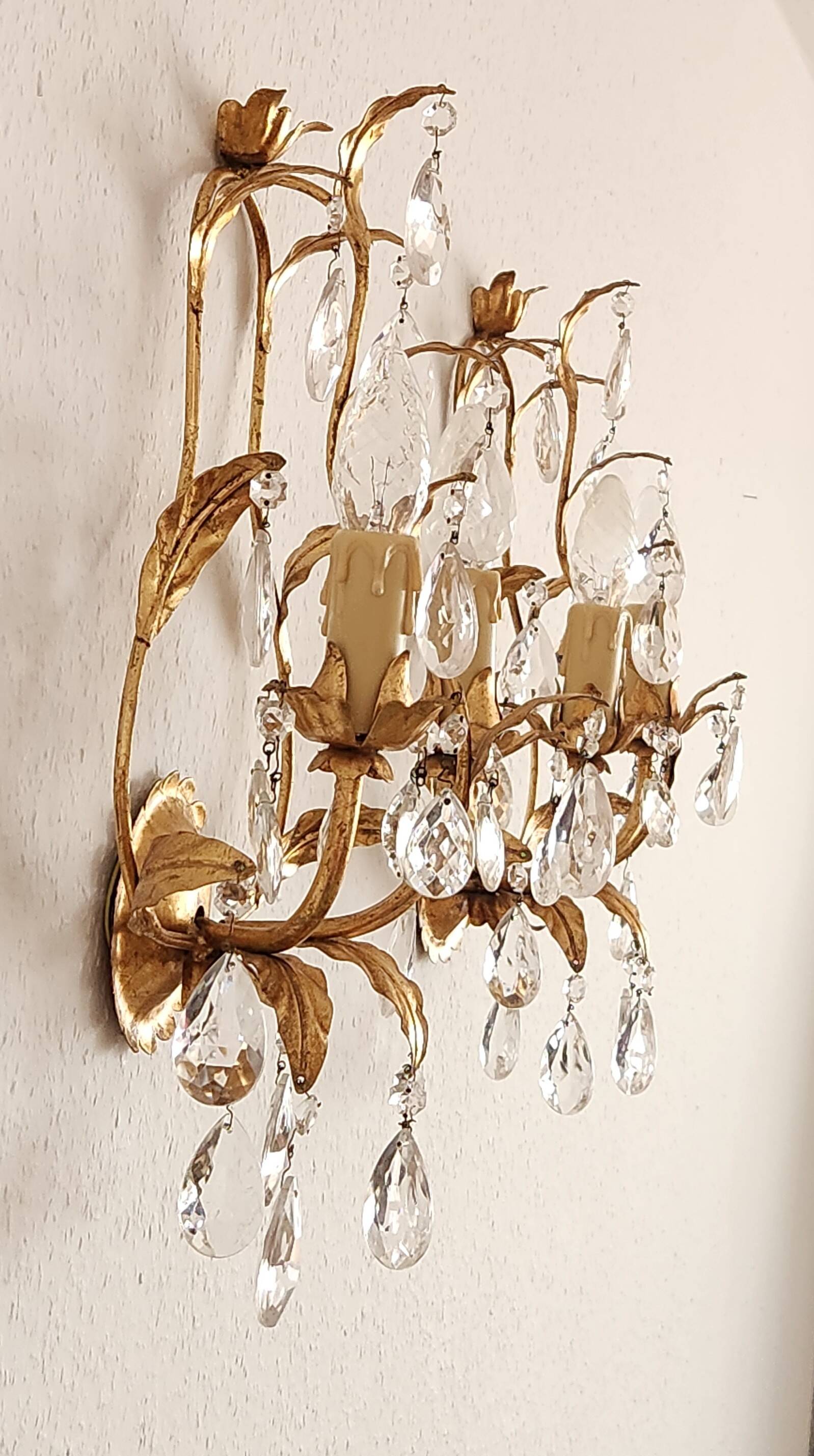 Hand-forged wall lamp gilded with gold leaf and crystals, Italy